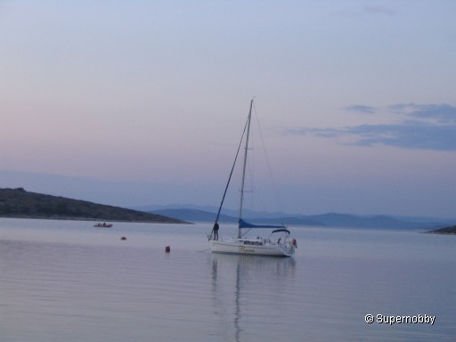 tied to a buoy next to the island Kakan - back to browser